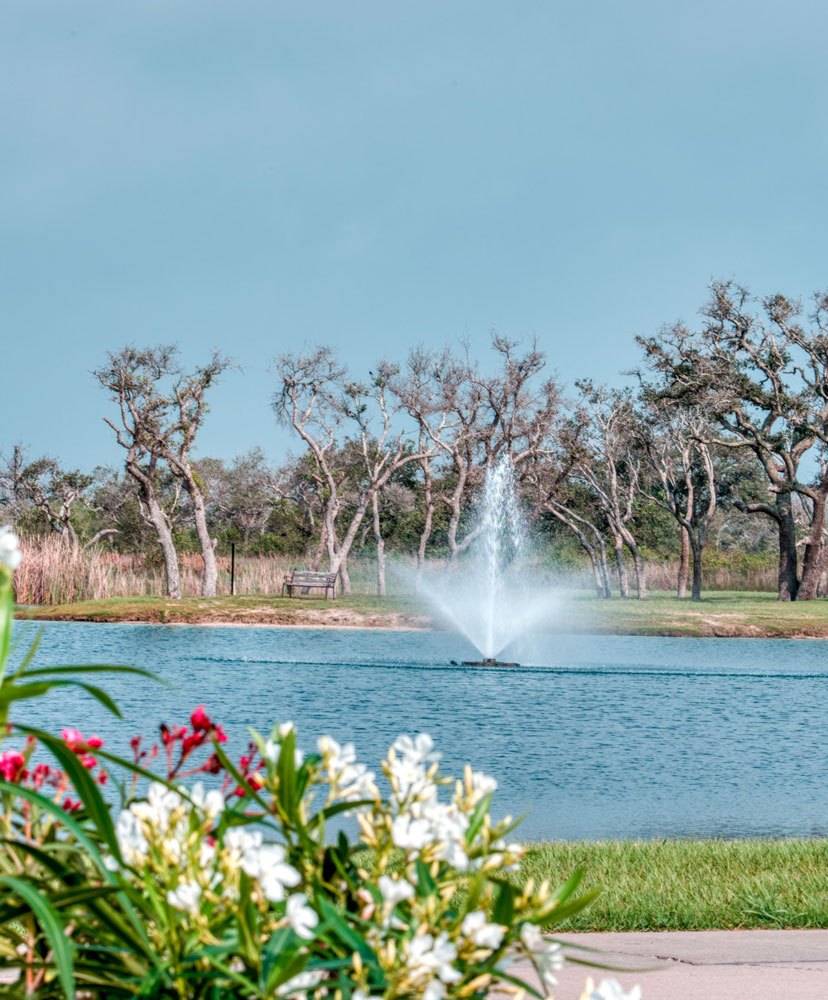 Pond and fountain at Southern Oaks RV Resort in Aransas Pass